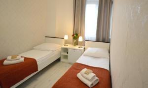 Posteľ alebo postele v izbe v ubytovaní Cracow Central Aparthotel