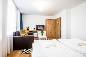 Letto o letti in una camera di Hotel Squash Dependance