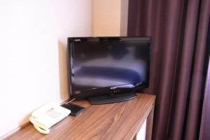 TV a/nebo společenská místnost v ubytování Hotel Il Credo Gifu