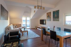 TV a/nebo společenská místnost v ubytování Rtina Appartements