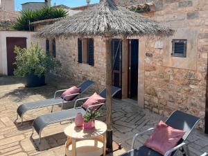 A patio or other outdoor area at Villa Petita Llombards