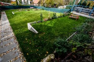 Giardino di Hotel Squash Dependance