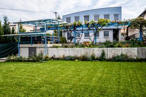 Giardino di Hotel Squash Dependance