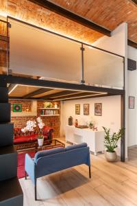 Posezení v ubytování Pop Art Loft con Giardino Privato
