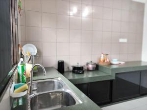 Fotografie z fotogalerie ubytování Grand Height Homestay 3A 10pax 4Rooms v destinaci Sibu