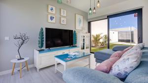 Telewizja i/lub zestaw kina domowego w obiekcie Villa Arcadia