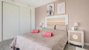 Łóżko lub łóżka w pokoju w obiekcie Villa Arcadia