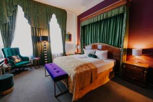 Postel nebo postele na pokoji v ubytování Boutique Hotel Rothenburger Hof