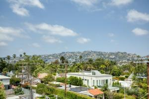 a view of a city with a white building at Hollywood 2BR w Roof BBQ nr MelroseFairfax LAX-890 in Los Angeles