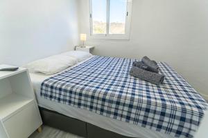 Łóżko lub łóżka w pokoju w obiekcie Cortijo Mandala Nerja