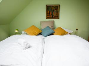 Ένα ή περισσότερα κρεβάτια σε δωμάτιο στο Holiday Home Strandwinkel by Interhome