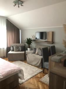 Гостиная зона в Apartments Dunja