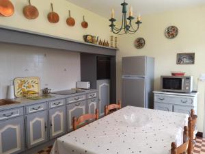 Kuchyň nebo kuchyňský kout v ubytování Maison Lumineuse entre Toulouse et Albi