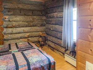 Postel nebo postele na pokoji v ubytování Holiday Home Ylläsrivit c 8 - villa änkyrä by Interhome