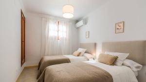 Posteľ alebo postele v izbe v ubytovaní Villa Angeles Nerja by Ruralidays