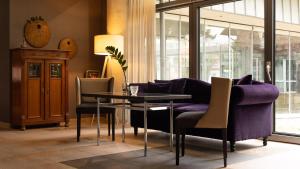 Posezení v ubytování Hotel An der Wasserburg