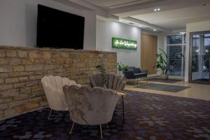 TV a/nebo společenská místnost v ubytování Hotel An der Wasserburg