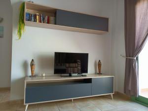 Estupendo Apartamento Gaudia電視和／或娛樂中心