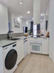 A kitchen or kitchenette at Residencial de la Yedra