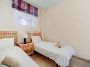 Posteľ alebo postele v izbe v ubytovaní Oasis la Cala 3 ,Pools, Parking and wifi