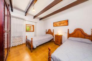 Ein Bett oder Betten in einem Zimmer der Unterkunft Can Company