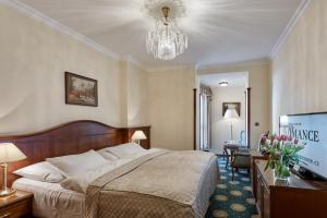 Postel nebo postele na pokoji v ubytování Hotel Romance