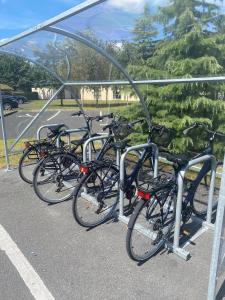 a row of bikes parked in a parking lot at Clanard Court Hotel in Athy