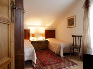 A bed or beds in a room at Agriturismo Le Spezie