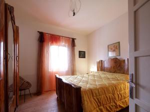 A bed or beds in a room at Agriturismo Le Spezie