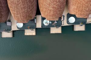 an overhead view of a dock with people on it at VeeVaree Riverkwai Resort in Ban Kaeng Raboet