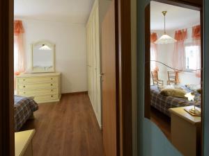 A bed or beds in a room at Agriturismo Le Spezie