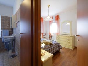 A bed or beds in a room at Agriturismo Le Spezie
