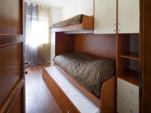 A bed or beds in a room at Agriturismo Le Spezie