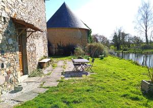 Zahrada ubytování Domaine La Synchronicité - Gîte et Chambres d'Hôtes