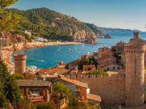 a view of a town with a castle and the ocean at Apartment Naranja by Interhome in Tossa de Mar
