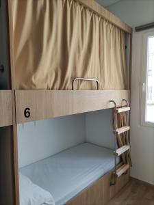 Albergue & Rooms Murgadán客房内的一张或多张床位