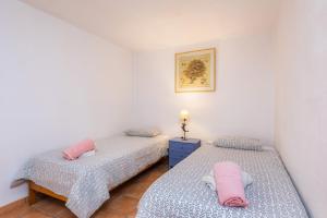 Postel nebo postele na pokoji v ubytování Casa Arturo