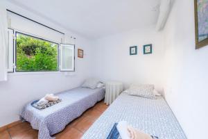 Postel nebo postele na pokoji v ubytování Casa Arturo