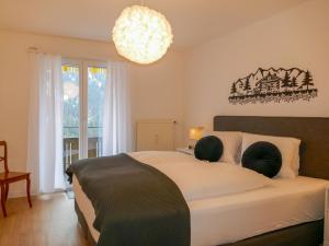 Postel nebo postele na pokoji v ubytování Apartment Chalet zur Höhe by Interhome