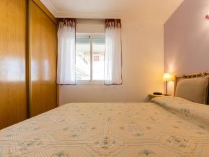 Postel nebo postele na pokoji v ubytování Apartment Aguamarina 7 by Interhome