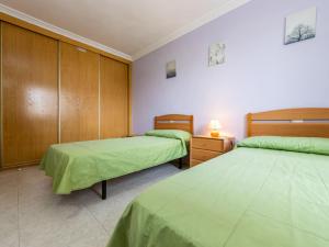 Postel nebo postele na pokoji v ubytování Apartment Aguamarina 7 by Interhome