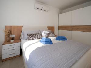 Posteľ alebo postele v izbe v ubytovaní Apartment Sakura by Interhome