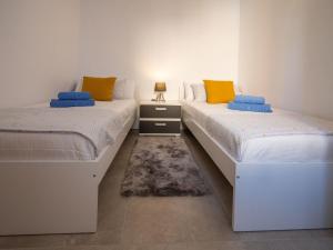 Posteľ alebo postele v izbe v ubytovaní Apartment Sakura by Interhome