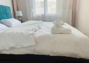 Posteľ alebo postele v izbe v ubytovaní Luxury apartment in city center