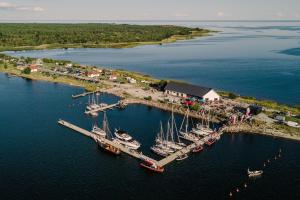 an aerial view of a marina with boats in the water at Seaside Apartments in Kõiguste