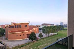 a view of a building from a balcony at [LOFT Romantico] Vista Panoramica vicino al Mare in Lido di Fermo