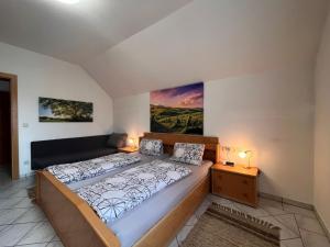a bedroom with a large bed in a room at Holiday Home LuxuSölk-3 by Interhome in Stein an der Enns