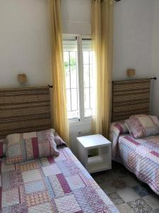 Posteľ alebo postele v izbe v ubytovaní Apartamentos Cala Isabel