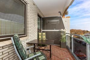 Ein Balkon oder eine Terrasse in der Unterkunft Strandnixe 301