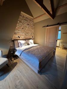 Postel nebo postele na pokoji v ubytování Guestsuite Couvert